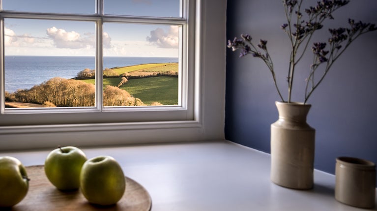 The sea view from a window in the kitchen at Chenhalls Barn, Cornwall